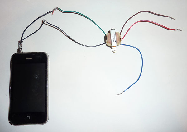 Elec science project phone plug and transformer connected during building of AM radio transmitter