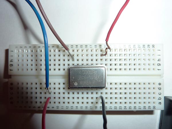 Elec science project oscillator connected to breadboard during building of AM radio transmitter
