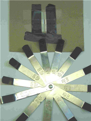 Photo showing slit and feeler gauges used to set approximate slit width.
