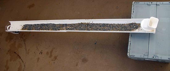 Environmental Engineering  Science Project sand topped by a layer of fine gravel in the downspout extender