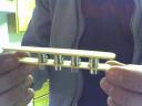 use a second set of magnets to hold the first magnets in place while the glue sets