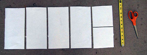 This photo shows four side-by-side paper towels (11 x 5.5 inches) and two paper towels (5.5 x 5.5 inches).