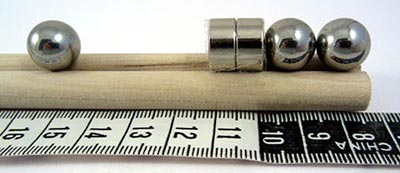 A one-stage Gauss rifle. Note the two ball bearings touching the magnet stage.
Physics science project