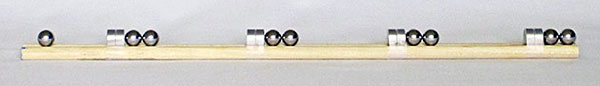 A four-stage Gauss rifle with the 'trigger' ball bearing.
Physics science project