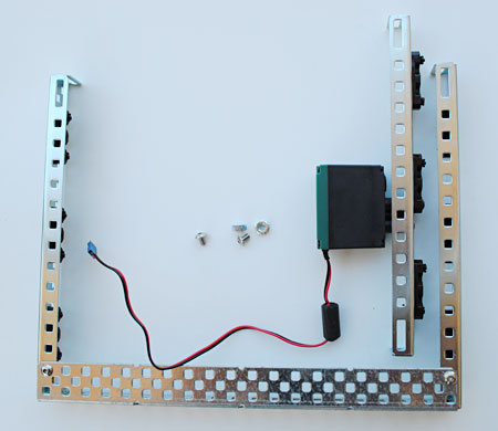 This photograph shows the parts that you use to attach the stabilizing rails
Robotics science project