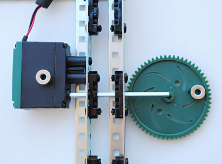 You will need a shaft and two collars to attach the gear to the motor and chassis. 
Robotics science project
