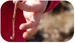Worm; Source: Bigstock, 'holding worm'.