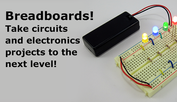 LEDs and a battery pack inserted into a breadboard