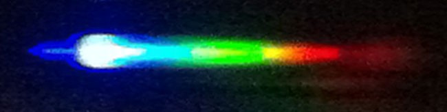 Color spectrum from blue to red being overexposed on the left end causing some blue to appear white and ruining the image