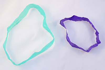 Two rings cut from different plastic bags