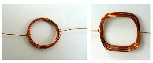 Copper wire coiled in the shape of a circle on the left and the shape of a square on the right