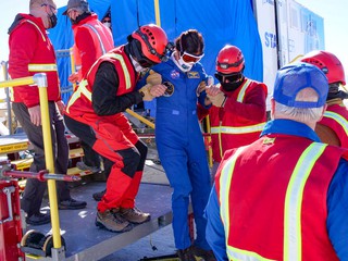 astronaut returning trying to walk