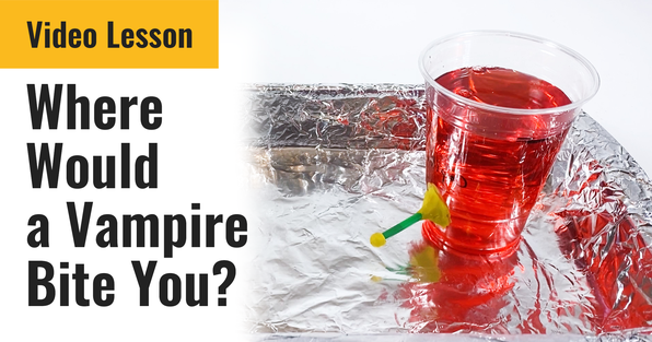 Dish lined with aluminum foil with a plastic cup in it that has a hole and a straw to model blood flow through an artery