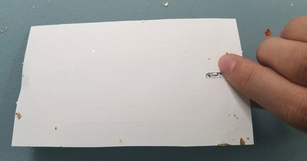The back of the metal leaf circuit, vinyl, and temporary tattoo backing 