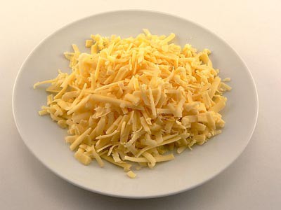 A plate of grated cheesse