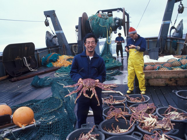 Marine biologist with crab