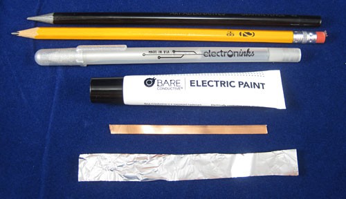 A graphite pencil, a number two pencil, conductive ink, electric paint, copper tape and a strip of aluminum foil