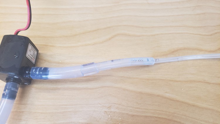 A pump with three tube segments of different diameters. 
