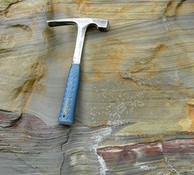  sedimentary rock with visible horizontal layers 