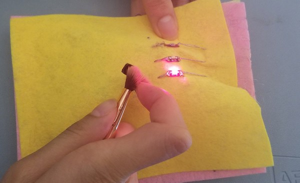 Red LED lighting up when exposed to dust. 