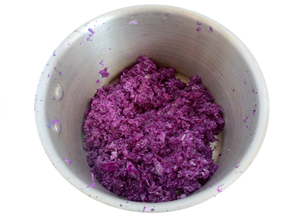 Pot of red-purple cabbage to be cooked to create an indicator solution