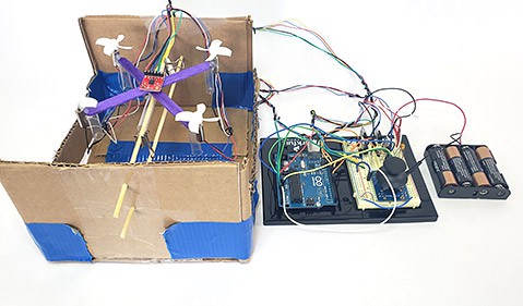 Experimental setup for automatically balancing a popsicle stick drone 