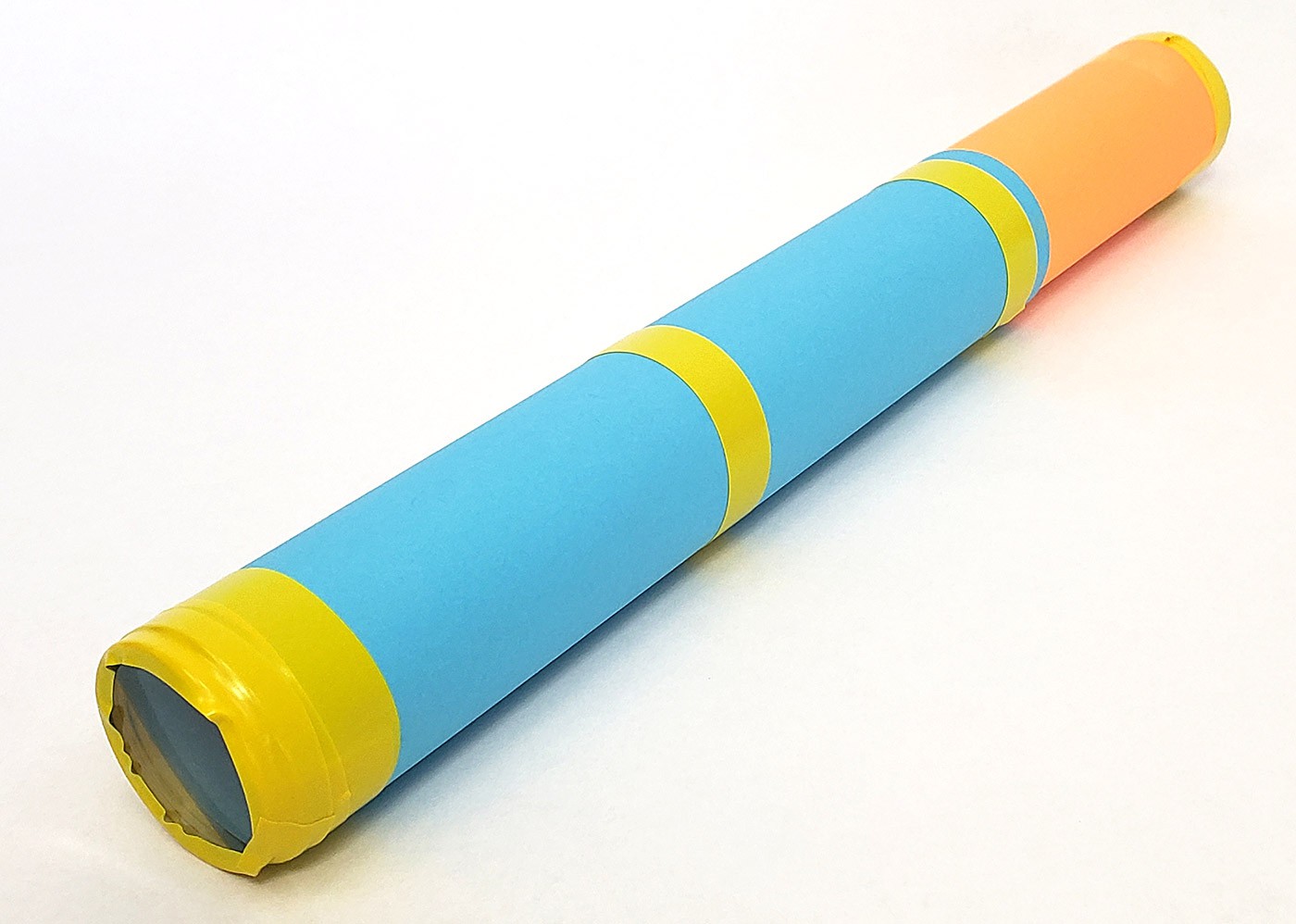 A bright cardstock tube with a lens taped to each end 