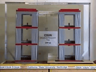 Animation of two identical model buildings on a shake table