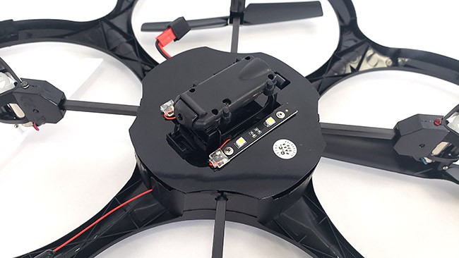 A camera mounted on the bottom of a drone