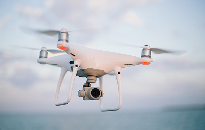  A quadcopter flying in the air. 