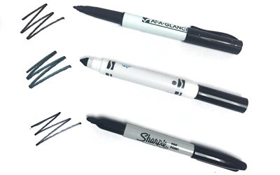 three black sharpie markers 