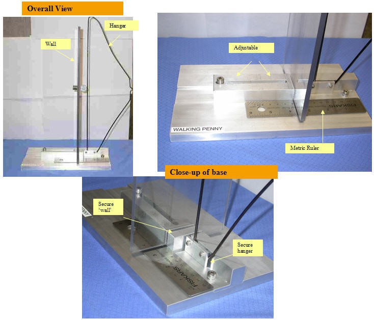A sheet of glass and metal hangar are held vertically and parallel to each other on a metal base
