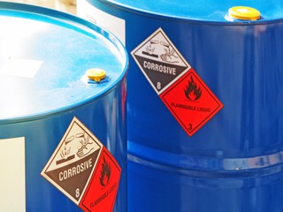 closeup shot of chemical storage labels on drums