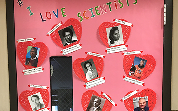 Classroom door decorated with pictures of scientists and engineers featured in Black History Month resource