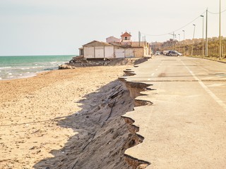 road that has been eroded by ocean