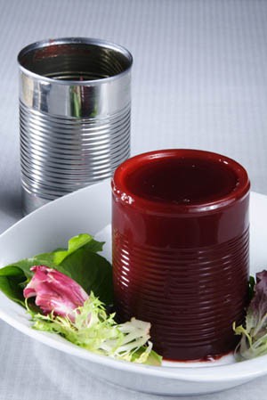 Cranberry jelly holds the shape of a tin can when upturned into a bowl