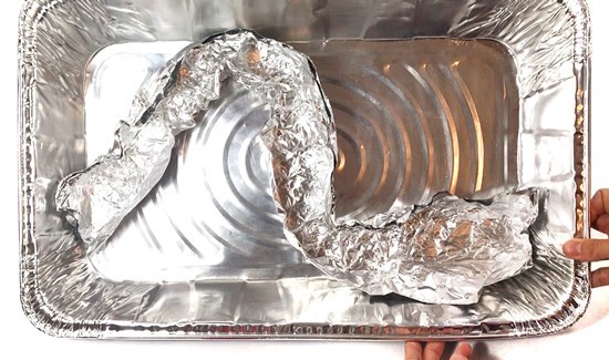 Curved river channel made from aluminum foil taped into an aluminum pan.