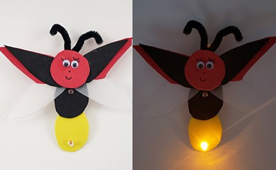 A night light shaped as a model firefly with an LED at its base