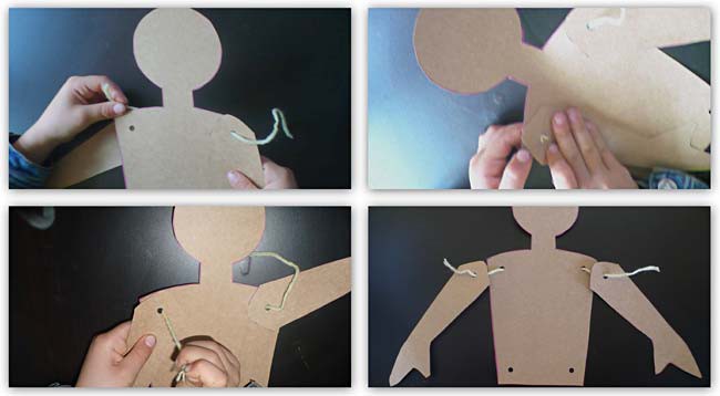 Threading yarn through punched out holes in card stock cut-outs of body parts