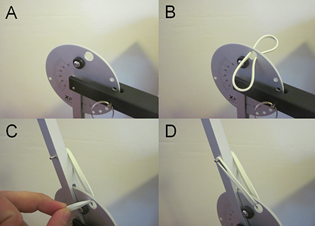 Four photos of a rubber band threaded through a hole in a disk and connecting to the launch arm of a catapult