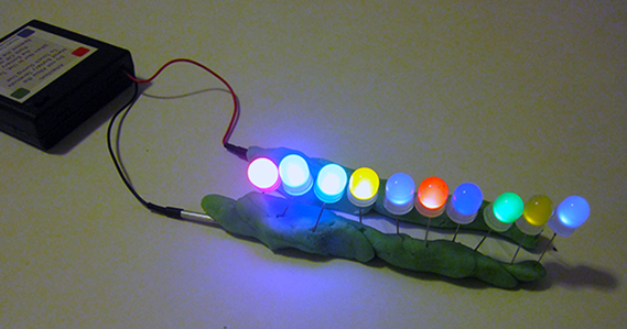 physics experiments electricity Circuit made from conductive dough with lit LEDs