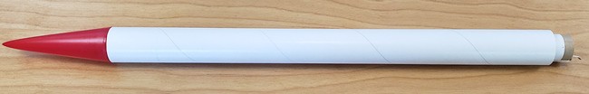 A partially assembled rocket with no fins.