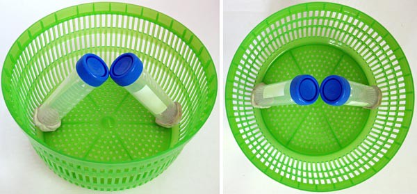 Two tubes are arranged in a salad spinners bowl opposite each other with caps touching over the center