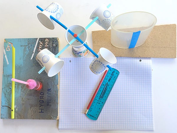 An anemometer made from paper cups and plastic straws