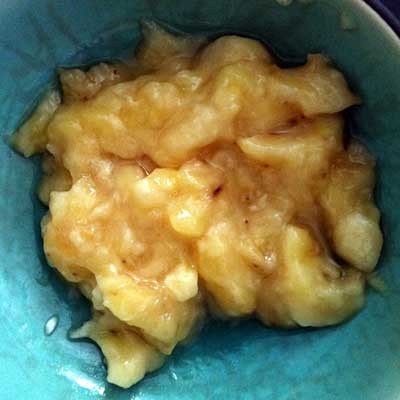 Thoroughly mashed banana in a bowl