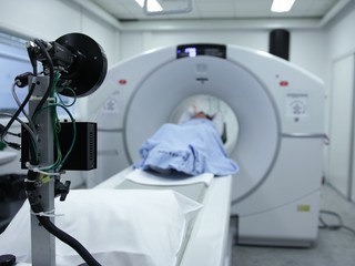 patient entering MRI machine scan