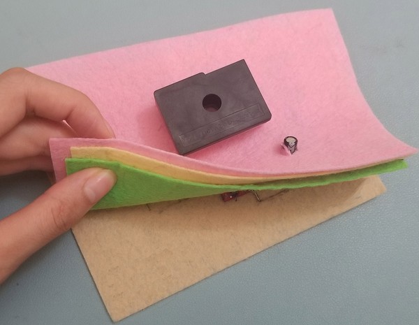 Capacitor hole cut in dust sensor patch. 