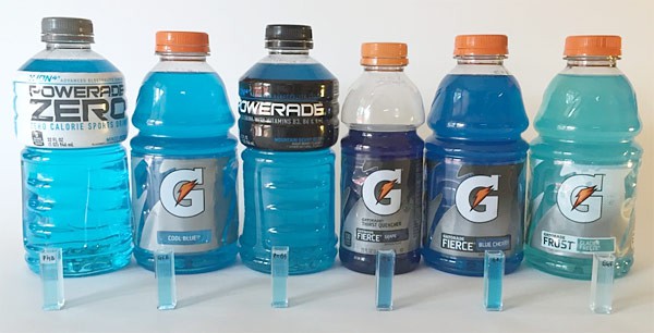 Six sports drinks containing Blue 1 are poured into cuvettes