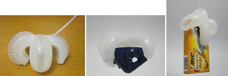 Three photos of an inflated cross-shaped silicon robot curling in on itself and grabbing objects