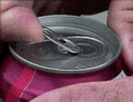 A finger lifts the tab of a closed can of soda